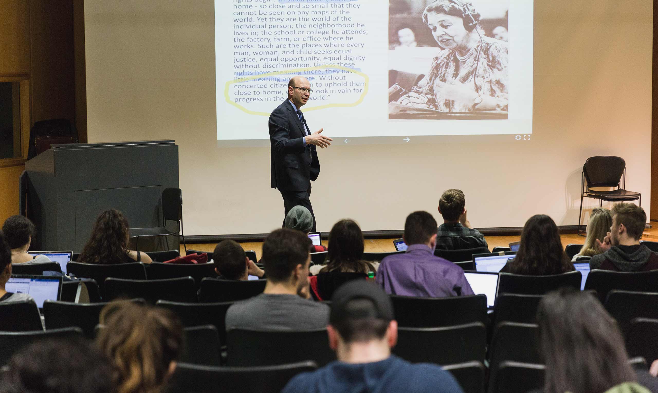 Patrice Dutil engaging his students in the lecture hall